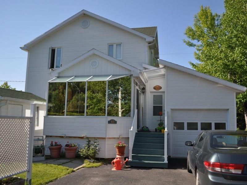 Summer on the beach, winter on snowmobile trails!