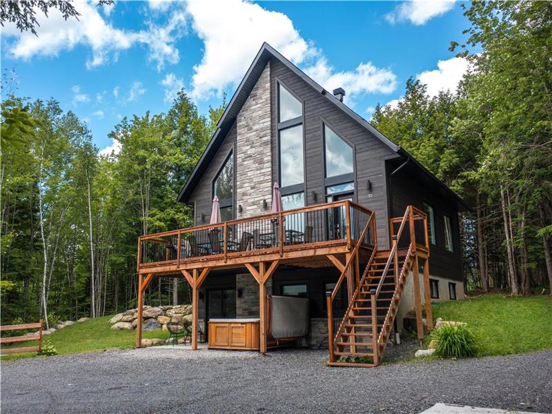 Chalet nature près de owl's head avec spa et foyer