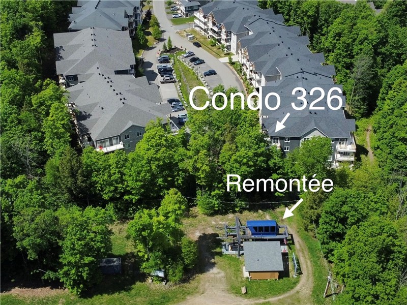 Luxurious ski (bike) in/ski (bike) out corner condo, indoor parking, outdoor pool.