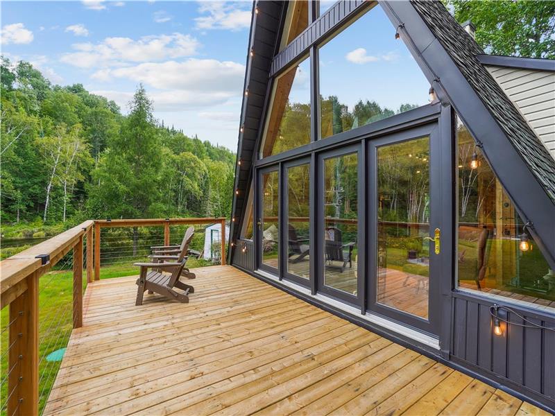 Authentic Swiss Chalet on the Shores of L'Écluse Lake