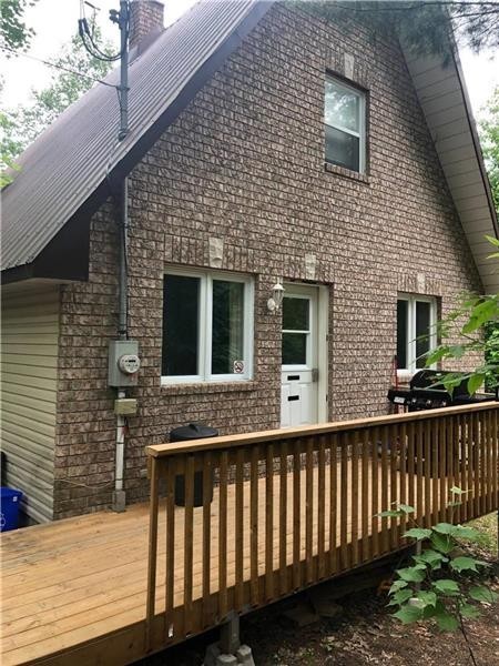 2 bdrm waterfront chalet winterized 45 mins from Ottawa/Gatineau swimming fishing income potential
