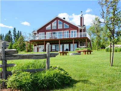 Chalets du Massif offering a magnificent view of the river and close to the Massif