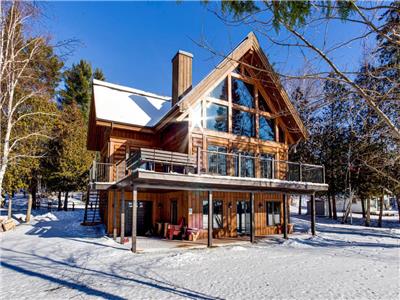 CHALET PRESTIGE **ALONG THE LAKE, PRIVATE BEACH** CITY OF LAC SAINT PAUL