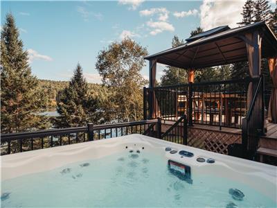 At the pines cottage - stunning lakeside with SPA