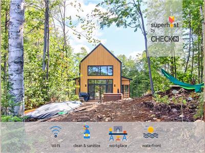 Chalet Le Phoenix au bord de l'eau | Lac Lili  Chertsey dans Lanaudire  Fusion Rustique & Moderne