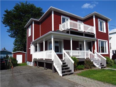 Grande maison  louer, 5 chambres, 2 tages, tout quip, prs des services, 5 minutes du fleuve