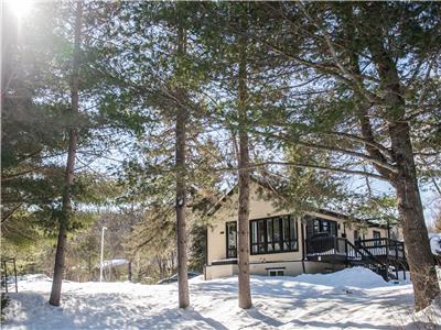 Chalet des 7 castors, bord de l'eau, plage et spa