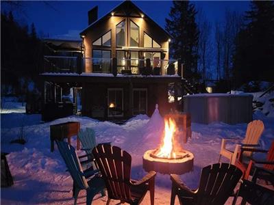 Chalet Un bout de paradis, bord de l'eau, piscine et spa