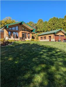Nestled in it's private valley sits this Mont Tremblant rental, ski chalet, house winter season