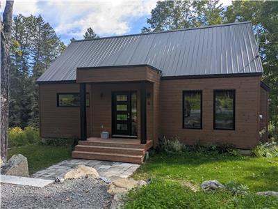 New Cottage in the woods 5 minutes away from the village and ski resorts