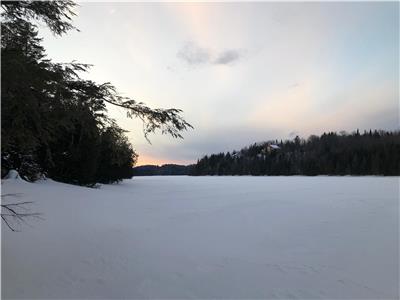 Serene waterfront cottage located in the Exclusive Domaine Lac St-Victor