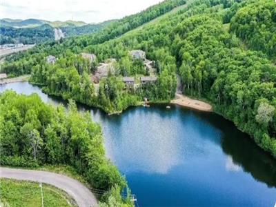 Votre camp de base familial  Mont Tremblant cet t. Lac, plage, piscine, vlo et golf