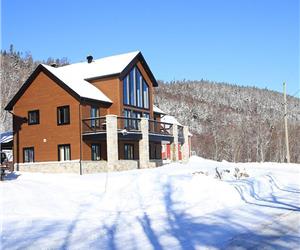 Chalet Le Bellevue located at the heart of Massif du Sud, sleep 14 persons, spa, snowmobile, quad