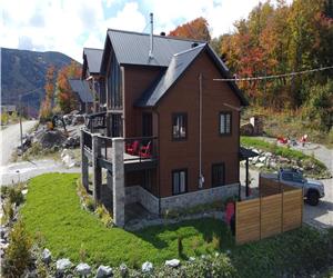 Chalet Le Bellevue located at the heart of Massif du Sud, sleep 14 persons, spa, snowmobile, quad