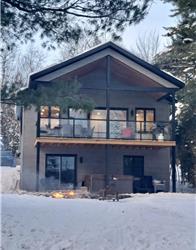 Loup Gris - Chalet au bord du lac Libby