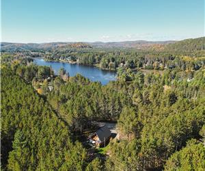 Chalet en bois rond avec plage, spa, volleyball et +