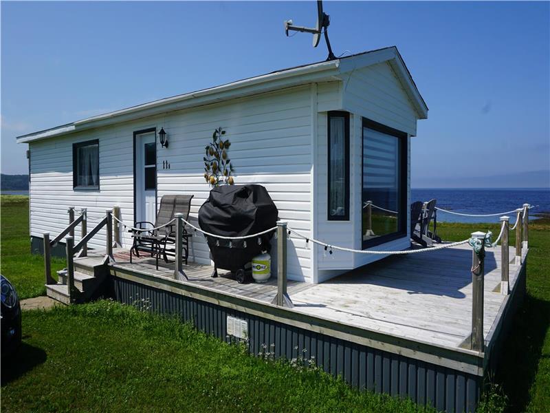 Vue panoramique sur le fleuve. Chalet à louer SteMadeleinedela