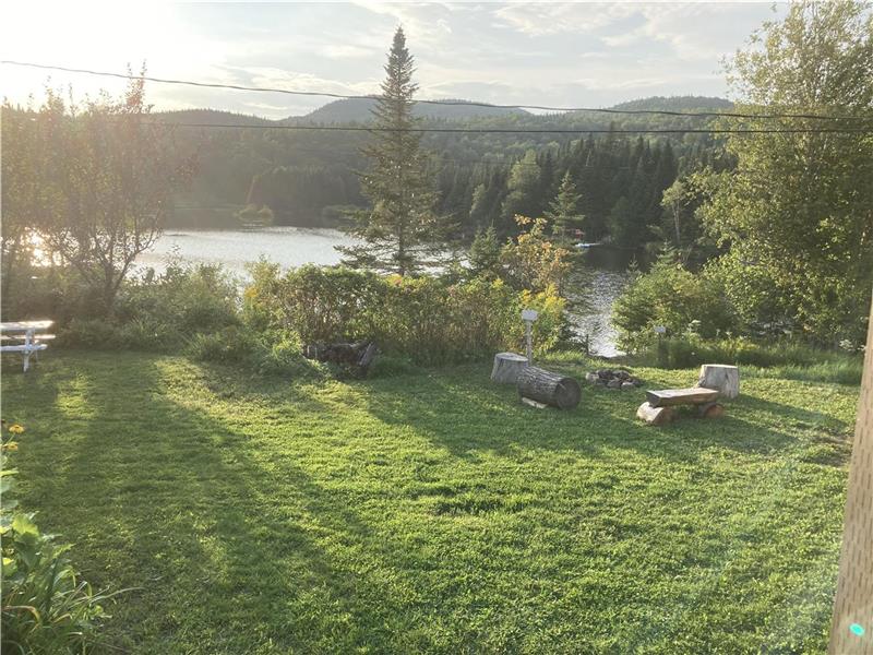 Chalet directement sur le lac avec Chalet à louer LacBeauport PL36723 ChaletsAuQuebec